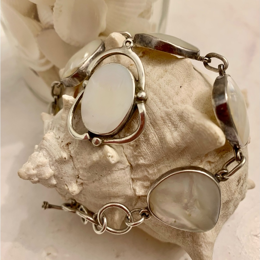 Bundle made. 1 silver Pendant 950 and Abalone w/pewter bracelet good condition